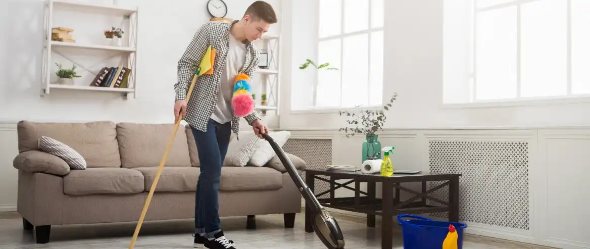 man trying to clean everything all at once