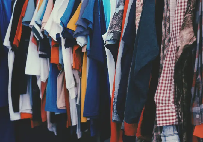 neatly hung clothes in closet
