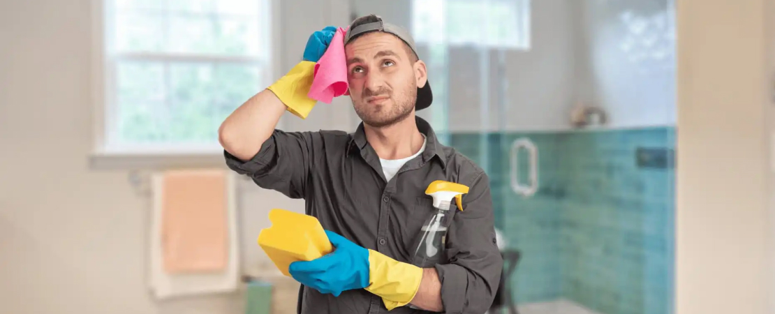 man confused at bathroom cleaning