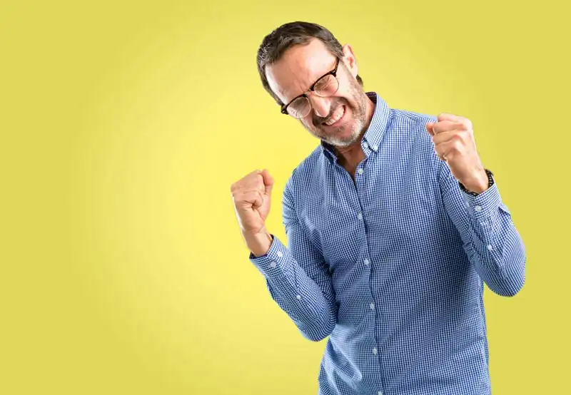 happy man with a yellow background