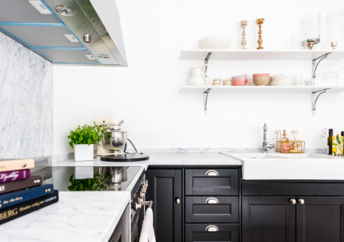 Clean, clutter-free kitchen showing natural cockroach prevention using essential oils and cinnamon.