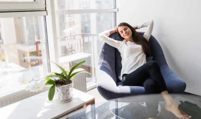 woman relaxing at the couch