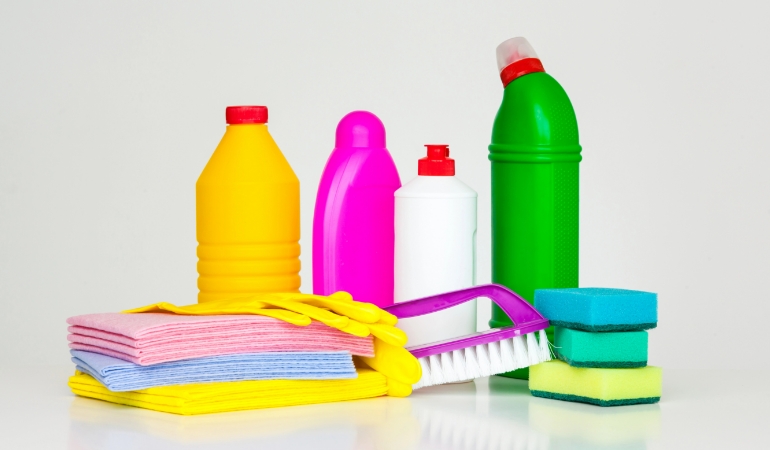 Harmful chemicals and safety warning symbols representing toxins in oven cleaners.