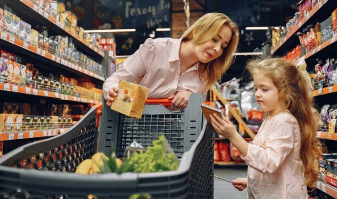 mother and daughter doing grocery