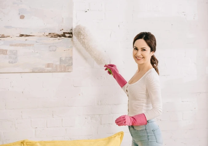 woman dusting