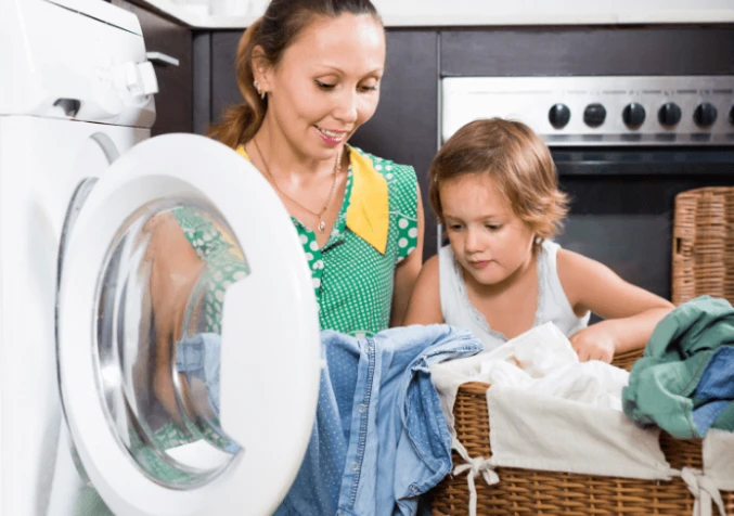 teachings kids to do laundry