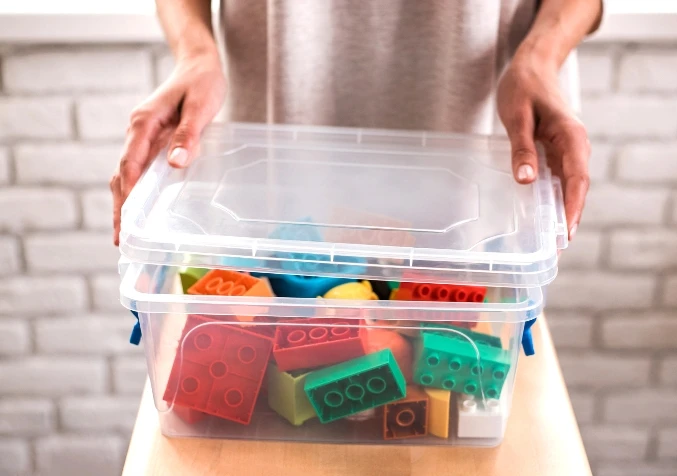 storing toy blocks in a bin