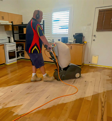 LED Cure Step 1 Sanding floor stripping old coating