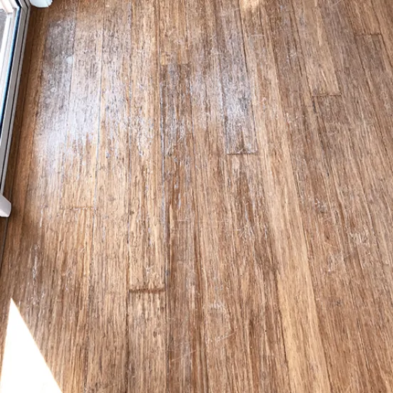 Scratched And Sun Damaged Bamboo Floorboards Before Restoration