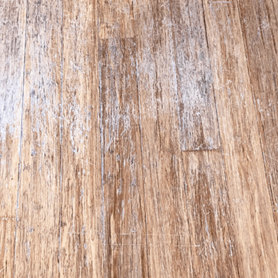 Close Up Photo Of Scratched Timber Floor Before Restoration