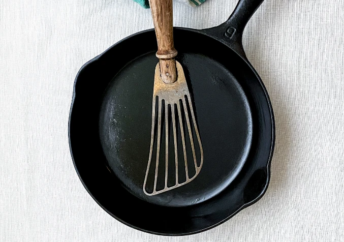 seasoning cast iron pan with olive oil