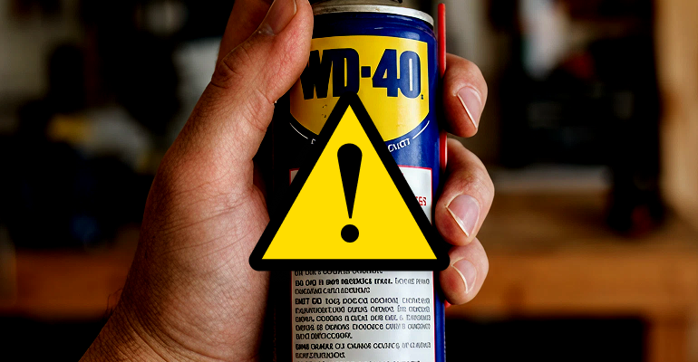 WD-40 caution showing surfaces where it should not be used