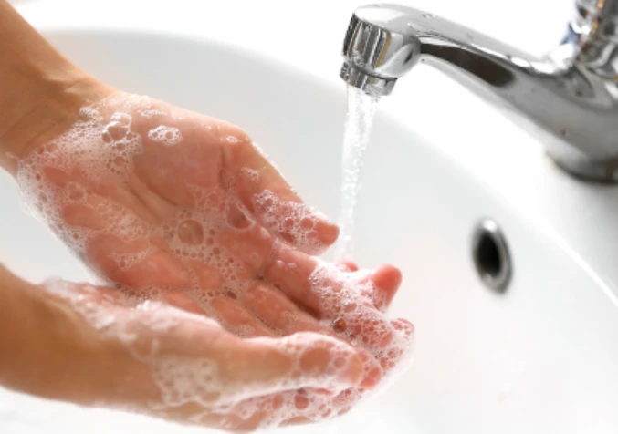 washing hands with castile soap