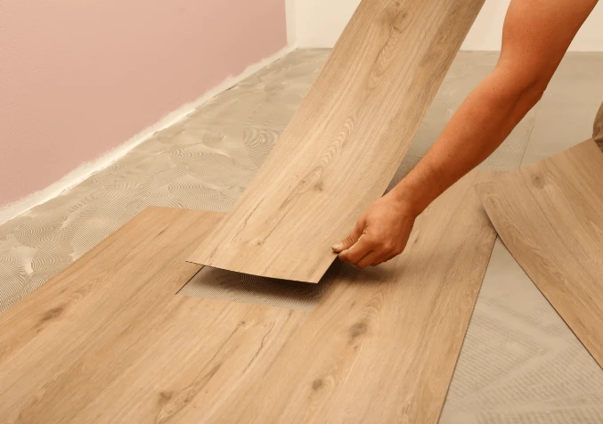 laying down vinyl floors