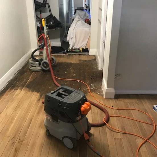 Old Worn And Stained Hallway Before Floor Sanding