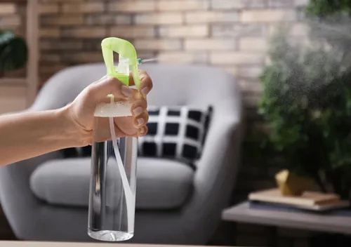 Homemade air freshener using rubbing alcohol and essential oil in spray bottle