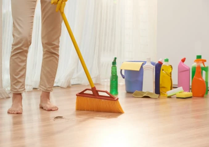 sweeping wood floors