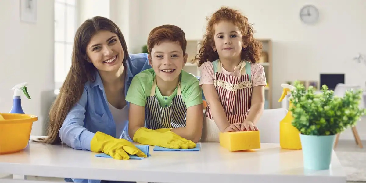 mother teaching kids how to clean
