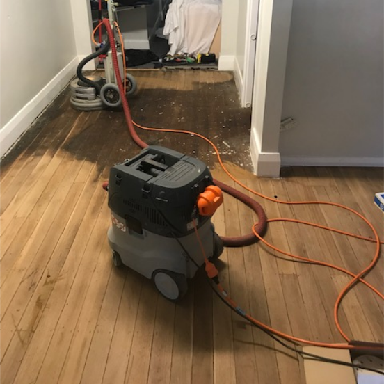 Old Worn And Stained Hallway Before Floor Sanding