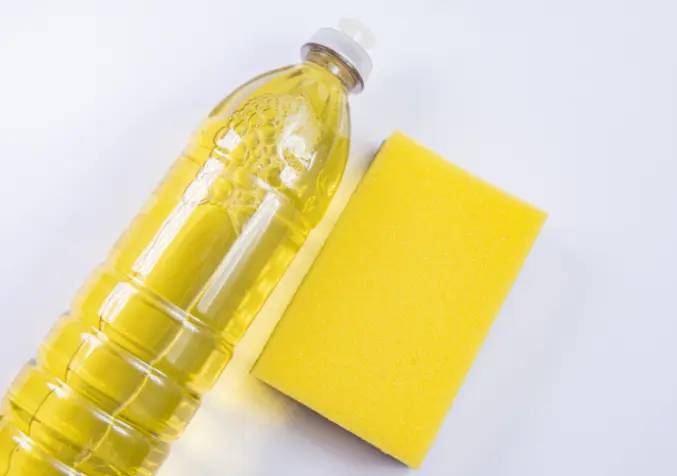 bottle of dish soap for treating rust stain on carpet