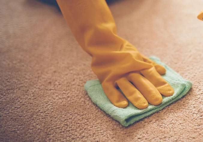 absorbing red cordial spill on to towel