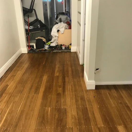 Old Worn And Stained Hallway After Floor Sanding