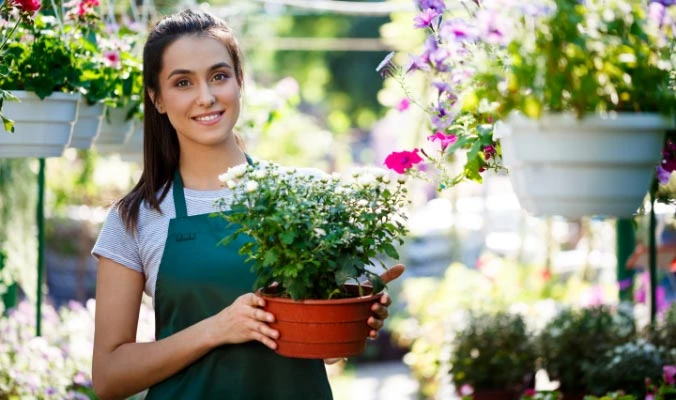 woman with potted plant