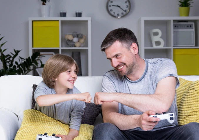 father and son bonding over video games